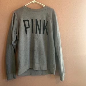 Victoria’s Secret Pink sweatshirt.